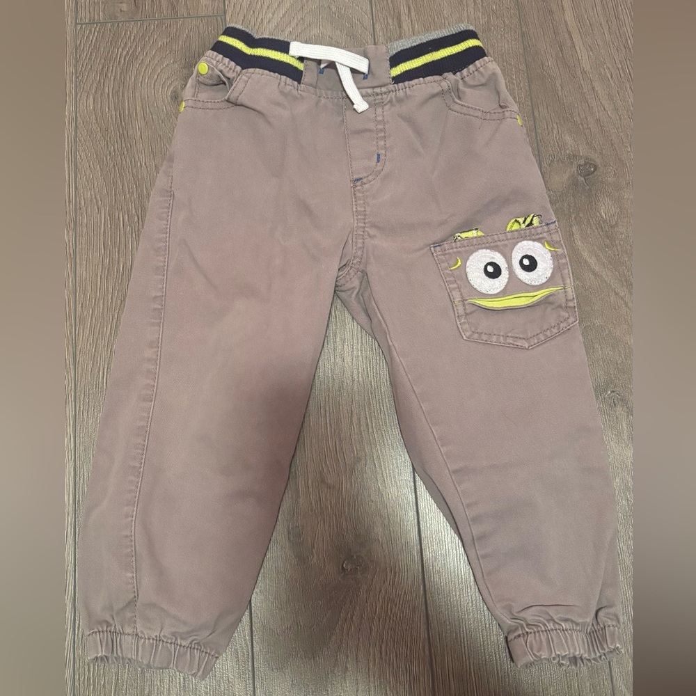 Kids Taupe Drawstring Pants with Pocket Monster Accent